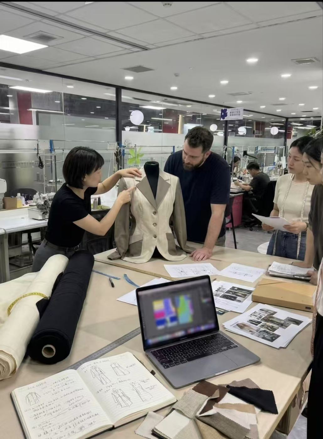 Apparel sample review meeting with customer and design team